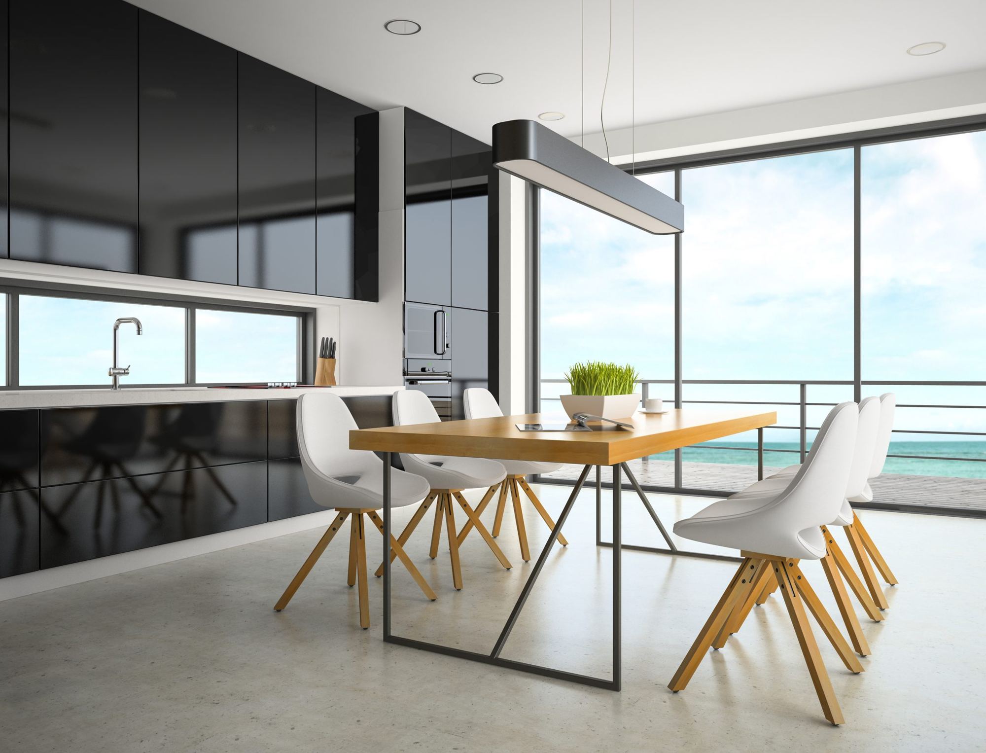 Modern kitchen with a timber dining table and floor-to-ceiling windows